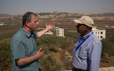 US Democratic congressional candidate Brad Lander (left) speaks with Yasser Alqam (right), spokesperson of the Turmus Ayya municipality, while visiting the West Bank town, October 23, 2026. (AP/Leo Correa) US Democratic congressional candidate Brad Lander (left) speaks with Yasser Alqam (right), spokesperson of the Turmus Ayya municipality, while visiting the West Bank town, October 23, 2026. (AP/Leo Correa)