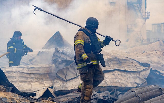 Rescuers work on the roof of a damaged building following Russia’s air attack in Kharkiv, Ukraine, October 23, 2026. (AP Photo/Andrii Marienko) Rescuers work on the roof of a damaged building following Russia’s air attack in Kharkiv, Ukraine, October 23, 2026. (AP Photo/Andrii Marienko)