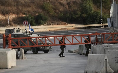 Israeli soldiers close a gate to vehicles during an army operation in Hebron, in the West Bank, October 24, 2026, a day after a Palestinian shooting attack in the area. (AP Photo/Mahmoud Illean) Israeli soldiers close a gate to vehicles during an army operation in Hebron, in the West Bank, October 24, 2026, a day after a Palestinian shooting attack in the area. (AP Photo/Mahmoud Illean)