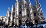 Italian police patrol the area around Milan’s Duomo Cathedral, Italy, October 24, 2026, ahead of a planned protest against the rising cost of living and deteriorating public services, one of several demonstrations organized across Italy by groups spanning the political spectrum. (AP Photo/Antonio Calanni)