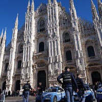 Italian police patrol the area around Milan’s Duomo Cathedral, Italy, October 24, 2026, ahead of a planned protest against the rising cost of living and deteriorating public services, one of several demonstrations organized across Italy by groups spanning the political spectrum. (AP Photo/Antonio Calanni)