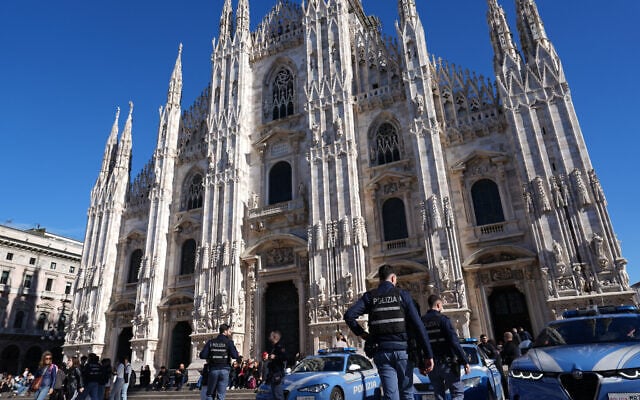 Italian police patrol the area around Milan’s Duomo Cathedral, Italy, October 24, 2026, ahead of a planned protest against the rising cost of living and deteriorating public services, one of several demonstrations organized across Italy by groups spanning the political spectrum. (AP Photo/Antonio Calanni) Italian police patrol the area around Milan’s Duomo Cathedral, Italy, October 24, 2026, ahead of a planned protest against the rising cost of living and deteriorating public services, one of several demonstrations organized across Italy by groups spanning the political spectrum. (AP Photo/Antonio Calanni)