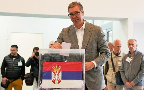 Aleksandar Vučić, leader of the right-wing Serbian Progressive Party (SNS), casts his vote in a parliamentary election in Belgrade, Serbia, October 25, 2026. (AP Photo/Darko Vojinovic)