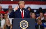US President Donald Trump speaks during a campaign rally at McMorran Place Arena in Port Huron, Michigan, October 25, 2026. (AP Photo/Duane Burleson)
