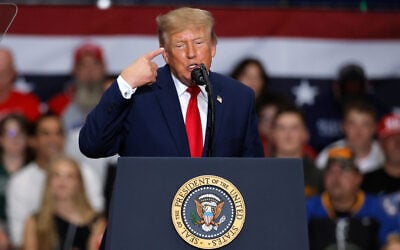 US President Donald Trump speaks during a campaign rally at McMorran Place Arena in Port Huron, Michigan, October 25, 2026. (AP Photo/Duane Burleson)