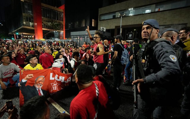 Supporters of Brazilian President Luiz Inacio Lula da Silva gather on runoff election night in Sao Paulo, Brazil, October 25, 2026. (AP Photo/Natacha Pisarenko) Supporters of Brazilian President Luiz Inacio Lula da Silva gather on runoff election night in Sao Paulo, Brazil, October 25, 2026. (AP Photo/Natacha Pisarenko)