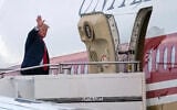 US President Donald Trump waves as he boards Air Force One, October 25, 2026, at Selfridge Air National Guard Base, Mich. (AP Photo/Julia Demaree Nikhinson)