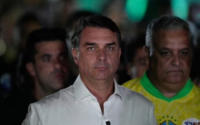 Opposition presidential candidate Sen. Flavio Bolsonaro arrives at his election night event after the presidential runoff in Brasilia, Brazil, October 25, 2026. (AP Photo/Eraldo Peres)