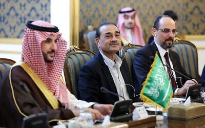 Pakistan’s Army Chief Field Marshal Gen. Asim Munir, center, Ibrahim Kalin, the head of Turkey’s intelligence service, right, and Saudi Arabia’s Defense Minister Khalid bin Salman, left, attend a meeting of high-level delegations from Saudi Arabia, Pakistan and Turkey with senior Iranian officials in Tehran, Iran, October 26, 2026. (Iranian Presidency Office via AP)