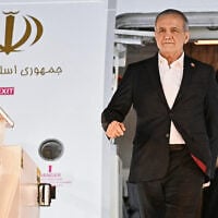 Iranian President Masoud Pezeshkian arrives for the Summit of Heads of State and Government of the Gas Exporting Countries Forum (GECF) in Moscow, October 26, 2026. (Sergey Bobylev/8th GECF Summit Photo host agency via AP)