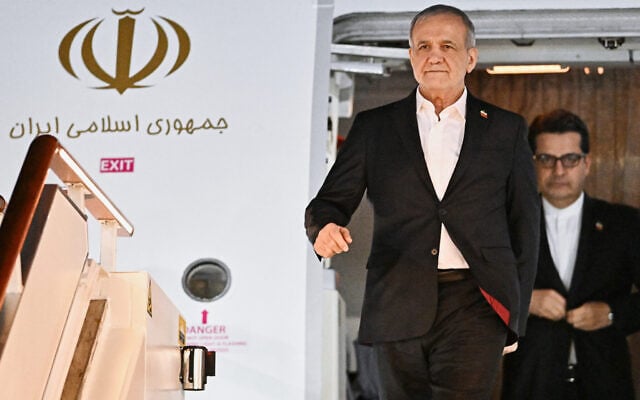 Iranian President Masoud Pezeshkian arrives for the Summit of Heads of State and Government of the Gas Exporting Countries Forum (GECF) in Moscow, October 26, 2026. (Sergey Bobylev/8th GECF Summit Photo host agency via AP)