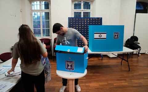Ballot boxes are set up at a polling station ahead of voting in Israel’s general election in Haifa, Israel, October 27, 2026. (AP Photo/Baz Ratner)
