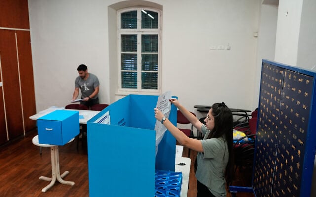 Ballot boxes are set up at a polling station ahead of voting in Israel’s general election in Haifa, Israel, October 27, 2026. (AP Photo/Baz Ratner)