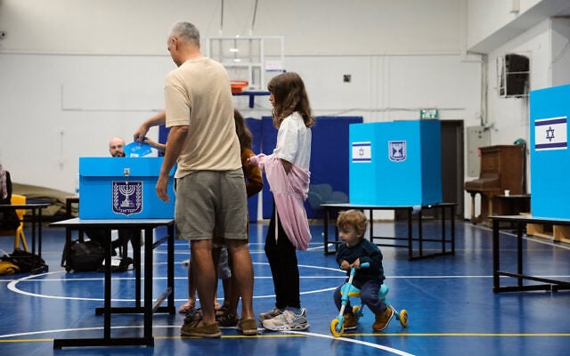 Voters cast their ballots at a polling station during Israel’s general election in Jerusalem, October 27, 2026. (AP Photo/Ohad Zwigenberg)
