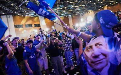 Supporters of Prime Minister Benjamin Netanyahu celebrate at the Likud party headquarters in Jerusalem following the release of exit poll results from the general elections, October 28, 2026. (AP Photo/David Goldman) Supporters of Prime Minister Benjamin Netanyahu celebrate at the Likud party headquarters in Jerusalem following the release of exit poll results from the general elections, October 28, 2026. (AP Photo/David Goldman)