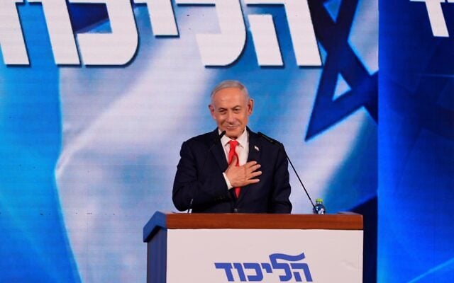 Prime Minister Benjamin Netanyahu gestures as he speaks to supporters at Likud party headquarters in Jerusalem following the release of the first exit poll results in Israel’s general election, October 28, 2026. (AP Photo/David Goldman)