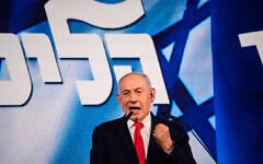 Prime Minister Benjamin Netanyahu speaks to his supporters at Likud party headquarters in Jerusalem after the release of the first exit poll results in Israel’s election, October 28, 2026. (AP/Ohad Zwigenberg)