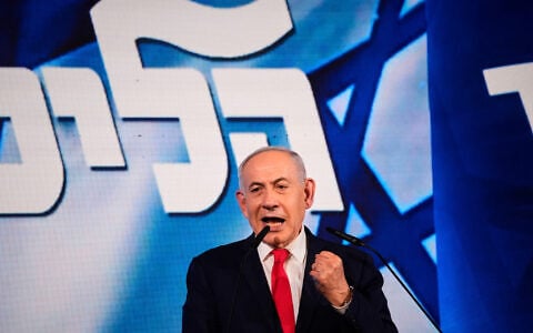 Prime Minister Benjamin Netanyahu speaks to his supporters at Likud party headquarters in Jerusalem after the release of the first exit poll results in Israel’s election, October 28, 2026. (AP/Ohad Zwigenberg)