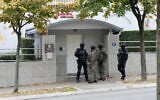 Serbian gendarmes guard the Israeli Embassy after an unidentified assailant attacked a guard with knives in Belgrade, Serbia, October 28, 2026. (AP Photo/Darko Vojinovic)