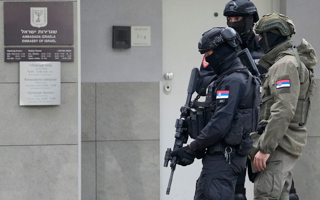 Serbian gendarmes guard the Israeli Embassy after an unidentified assailant attacked a guard with knives in Belgrade, Serbia, October 28, 2026. (AP Photo/Darko Vojinovic) Serbian gendarmes guard the Israeli Embassy after an unidentified assailant attacked a guard with knives in Belgrade, Serbia, October 28, 2026. (AP Photo/Darko Vojinovic)