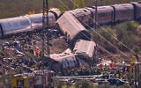 Emergency services work at the scene of a collision between two trains in Urda, Spain, on October 28, 2026. (AP Photo/Manu Fernandez)