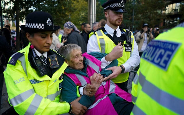 Police officers arrest a protester during a demonstration in support of Palestine Action, outside the US embassy, in London, October 31, 2026. (AP Photo/Alberto Pezzali) Police officers arrest a protester during a demonstration in support of Palestine Action, outside the US embassy, in London, October 31, 2026. (AP Photo/Alberto Pezzali)