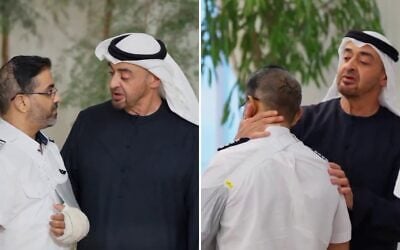 UAE President Sheikh Mohamed bin Zayed Al-Nahyan embraces flydubai pilot Smit Machchhar, during a reception for him and other crew members of Flight 1073 in Abu Dhabi on October 27, 2026. (Screenshots via X)