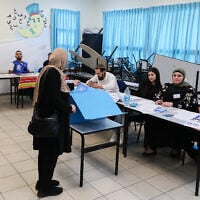 Arab Israelis cast their vote at a voting station in Tayibe, during the Knesset election on November 1, 2022. (Jamal Awad/Flash90) Arab Israelis cast their vote at a voting station in Tayibe, during the Knesset election on November 1, 2022. (Jamal Awad/Flash90)