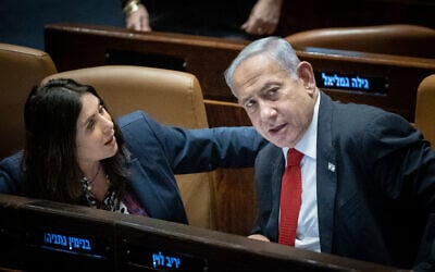 Prime Minister Benjamin Netanyahu with Minister of Transportation Miri Regev in the Knesset on February 20, 2023. (Yonatan Sindel/Flash90) Prime Minister Benjamin Netanyahu with Minister of Transportation Miri Regev in the Knesset on February 20, 2023. (Yonatan Sindel/Flash90)