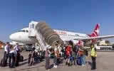 Travelers disembark an Electra plane at Ben Gurion International Airport. September 8, 2025. (Yossi Aloni/FLASH90)
