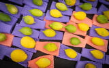 FILE: Etrogs at a market in Jerusalem on October 3, 2025. (Chaim Goldberg/Flash90)