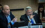 MK Yitzhak Kroizer, left, with his Otzma Yehudit party leader National Security Minister Itamar Ben Gvir during Interior committee meeting at the Knesset in Jerusalem, on July 8, 2026. (Yonatan Sindel/Flash90)