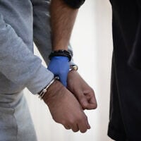 Illustrative: Arrested suspects at a hearing at the Jerusalem District Court August 18, 2026. (Chaim Goldberg/FLASH90) Illustrative: Arrested suspects at a hearing at the Jerusalem District Court August 18, 2026. (Chaim Goldberg/FLASH90)