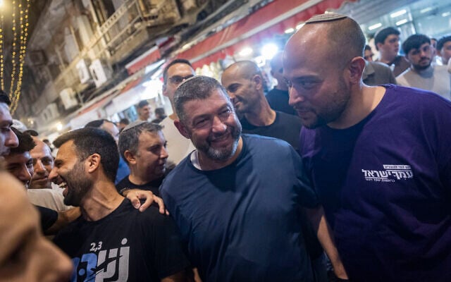 People of Israel party chairman Ofer Winter (C) and party member Yoseph Haddad (C) tour the Mahane Yehuda Market in Jerusalem ahead of the upcoming general elections, September 17, 2026. (Chaim Goldberg/Flash90) People of Israel party chairman Ofer Winter (C) and party member Yoseph Haddad (C) tour the Mahane Yehuda Market in Jerusalem ahead of the upcoming general elections, September 17, 2026. (Chaim Goldberg/Flash90)