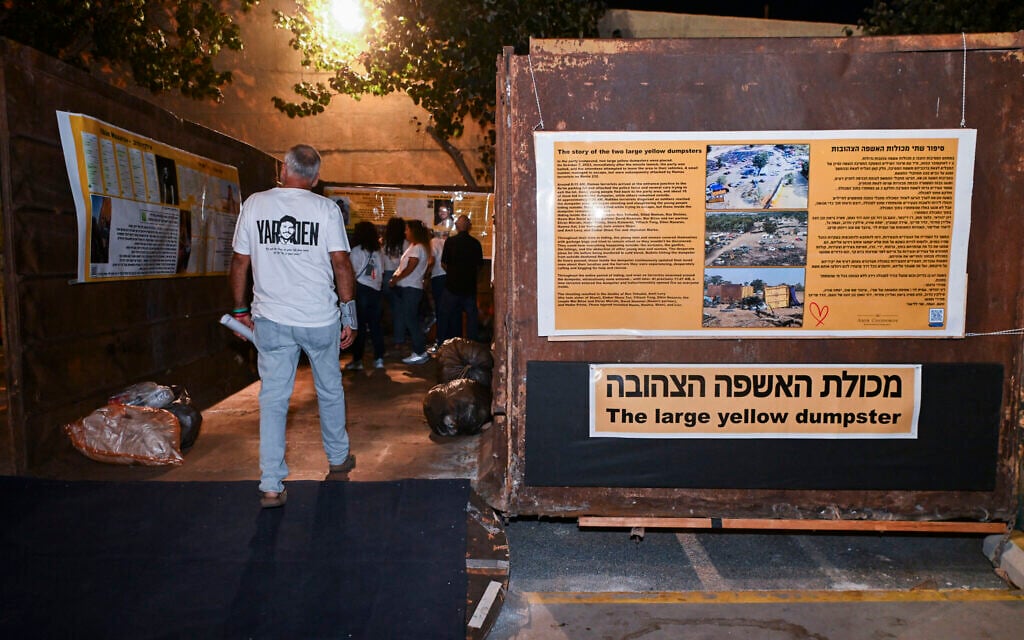 People visit 'The Space That Remains' exhibition, featuring personal belongings of victims of the October 7 massacre, at the Peres Center for Peace and Innovation in Tel Aviv, days before the third anniversary of the massacre, October 3, 2026. (Avshalom Sassoni/Flash90)