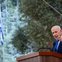 Prime Minister Benjamin Netanyahu speaks during a state memorial ceremony for civilians murdered in the October 7 massacre, marking three years since the Hamas attack, at Mount Herzl in Jerusalem, October 5, 2026. (Olivier Fitoussi/POOL)