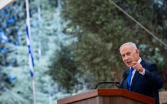 Prime Minister Benjamin Netanyahu speaks during a state memorial ceremony for civilians murdered in the October 7 massacre, marking three years since the Hamas attack, at Mount Herzl in Jerusalem, October 5, 2026. (Olivier Fitoussi/POOL)