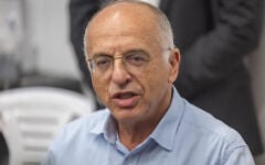 The chairman of the Central Elections Committee, Supreme Court Justice Noam Sohlberg, visits a printing factory in Kiryat Gat where ballot papers were being printed in preparation for the election, October 5, 2026. (Yonatan Sindel/Flash90)