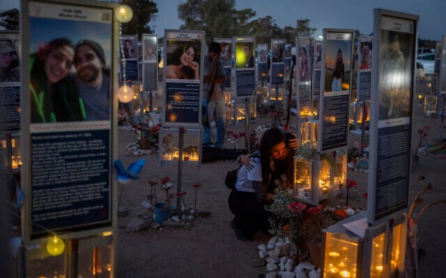 Family members and visitors gather at the Nova music festival memorial site near Kibbutz Re’im in southern Israel on the morning of October 7, 2026, three years after hundreds of people were murdered by Hamas terrorists at the site during the October 7 massacre. (Chaim Goldberg/Flash90) Family members and visitors gather at the Nova music festival memorial site near Kibbutz Re’im in southern Israel on the morning of October 7, 2026, three years after hundreds of people were murdered by Hamas terrorists at the site during the October 7 massacre. (Chaim Goldberg/Flash90)