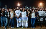 Families and people attend the national memorial ceremony marking three years since the October 7 massacre, at Yarkon Park in Tel Aviv, October 7, 2026. (Miriam Alster/Flash90)