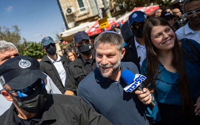 Finance Minister Bezalel Smotrich tours the Mahane Yehuda Market as part of his Religious Zionism party’s election campaign in Jerusalem, October 9, 2026. (Chaim Goldberg/Flash90)