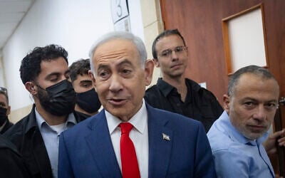 Prime Minister Benjamin Netanyahu arrives for a hearing in his corruption trial at the Jerusalem District Court, October 11, 2026. (Chaim Goldberg/Flash90)