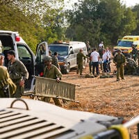 Israeli security and rescue forces evacuate injured people near the site of a deadly explosion of an unexploded Hezbollah ordnance during a school hike in the Ramim Ridge area in northern Israel, close to the border with Lebanon, October 12, 2026. (Ayal Margolin/Flash90)