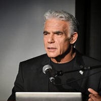 B'Yachad party member Yair Lapid speaks at the “Law and Lies” conference on October 12, 2026. (Avshalom Sassoni/FLASH90)