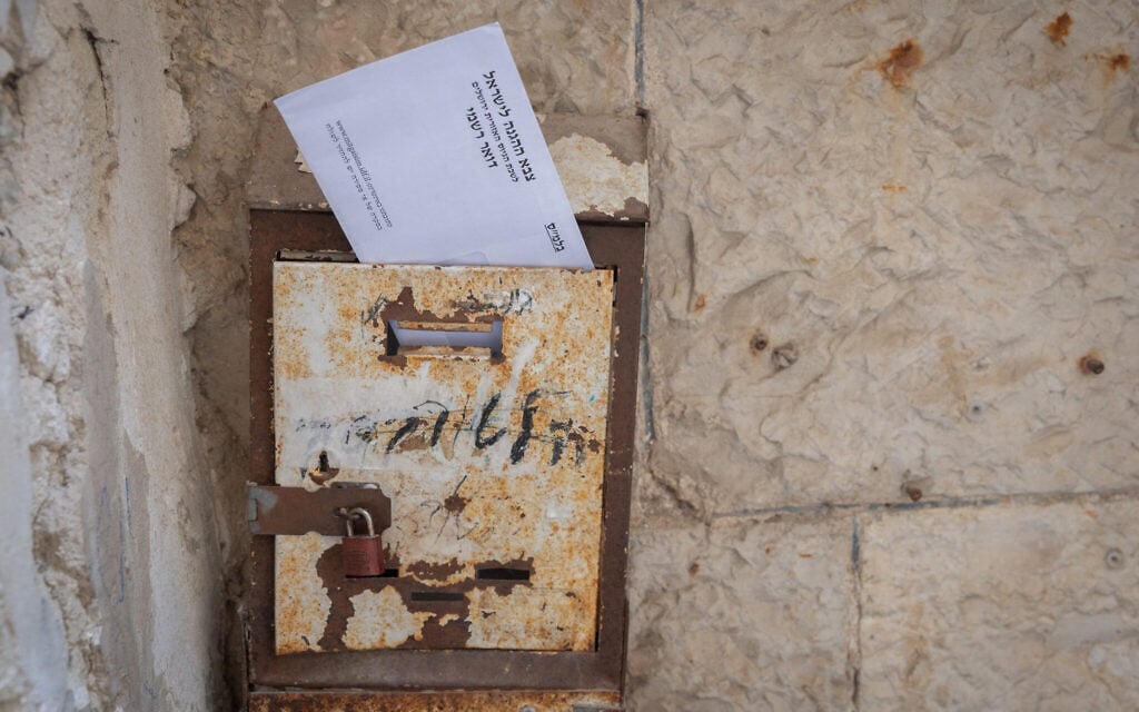 A letter from the IDF conscription offices is seen in a mailbox in the ultra-Orthodox Jerusalem neighborhood of Meah Shearim. October 14, 2026. (Chaim Goldberg/Flash90) A letter from the IDF conscription offices is seen in a mailbox in the ultra-Orthodox Jerusalem neighborhood of Meah Shearim. October 14, 2026. (Chaim Goldberg/Flash90)