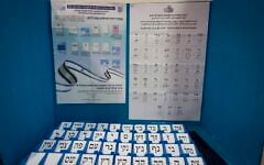 A sample voting booth is displayed at the Central Elections Committee warehouse in Shoham, ahead of Israel’s upcoming general elections, October 14, 2026. (Yonatan Sindel/Flash90)