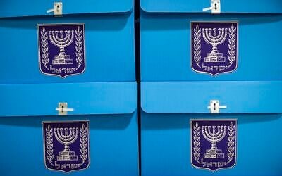 Workers prepare ballot boxes for the upcoming election at the Central Elections Committee warehouse in Shoham, ahead of their distribution to polling stations across the country, October 14, 2026. (Yonatan Sindel/Flash90) Workers prepare ballot boxes for the upcoming election at the Central Elections Committee warehouse in Shoham, ahead of their distribution to polling stations across the country, October 14, 2026. (Yonatan Sindel/Flash90)