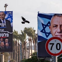 Election campaign billboards featuring Yashar party chairman Gadi Eisenkot, right, and Likud party chairman Prime Minister Benjamin Netanyahu alongside opposition leaders are displayed along a roadside in the northern Israeli city of Haifa, ahead of Israel’s upcoming general elections, October 17, 2026. (Sharon Leibel/Flash90)