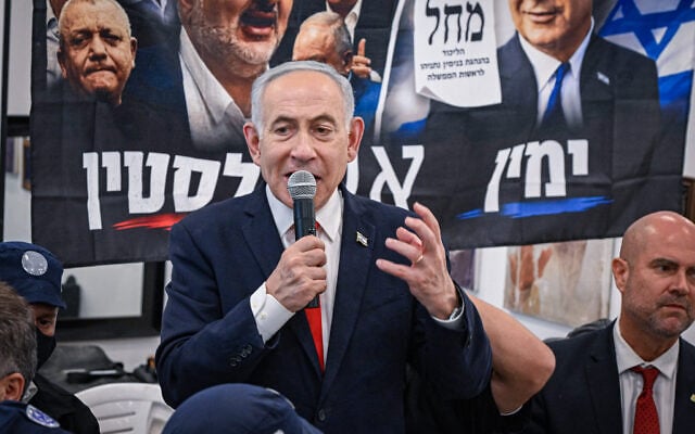Prime Minister Benjamin Netanyahu visits the Hatikva Market in Tel Aviv as part of the Likud party’s campaign ahead of Israel’s upcoming general election, October 22, 2026. (Avshalom Sassoni/Flash90)