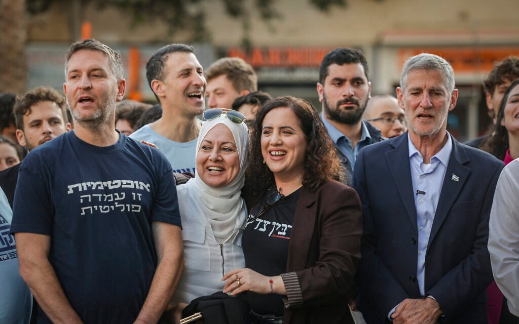 Democrats party chairman Yair Golan (L) and party members and members of the public attend a memorial ceremony marking the 31st anniversary of the assassination of former prime minister Yitzhak Rabin, at the site where he was murdered in Rabin Square, Tel Aviv, October 22, 2026. (Miriam Alster/Flash90) Democrats party chairman Yair Golan (L) and party members and members of the public attend a memorial ceremony marking the 31st anniversary of the assassination of former prime minister Yitzhak Rabin, at the site where he was murdered in Rabin Square, Tel Aviv, October 22, 2026. (Miriam Alster/Flash90)